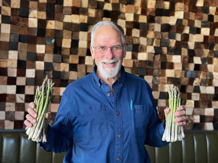 Mike Levine of Fruit of Levine with freshly picked asparagus